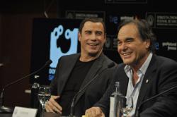 Jhon Travolta y Oliver Stone